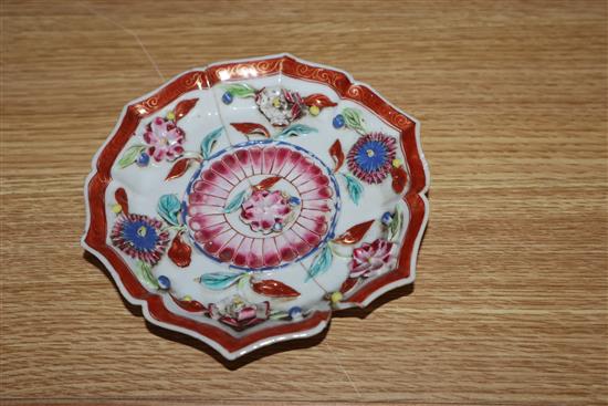 An 18th century Chinese Export famille rose teapot, cover and a similar dish
